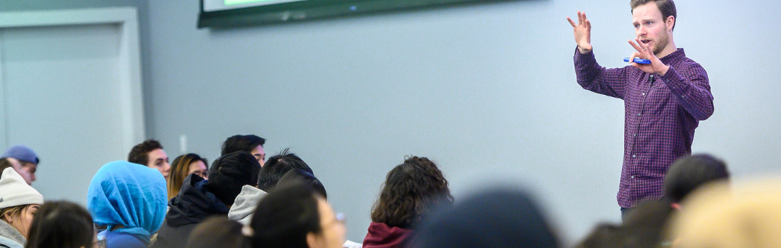 Instructor teaching in a physics class